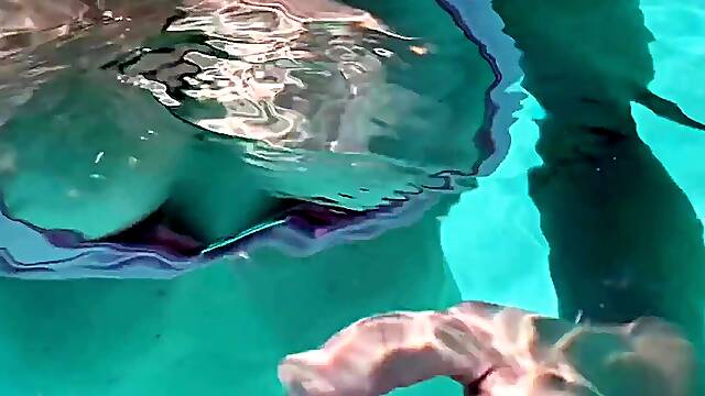 Italian MILF gets wet in a bikini